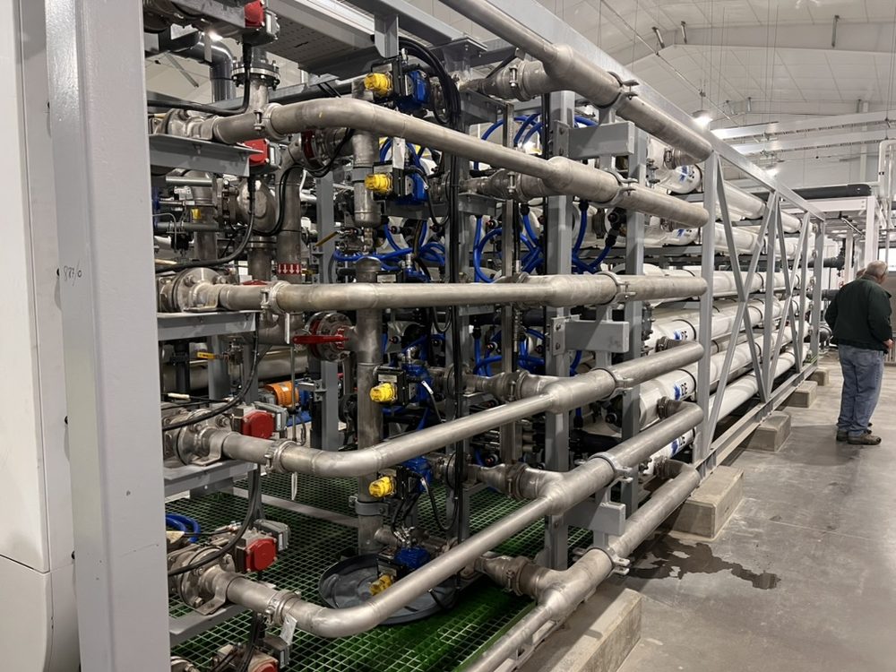 Reverse-osmosis membrane treatment train inside a water plant